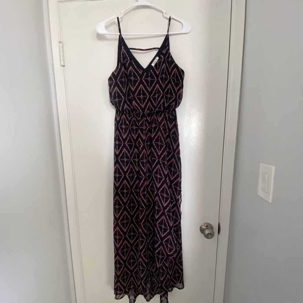 Sienna Sky Maxi dress, pink, purple white design on navy dress. Faux wrap bottom